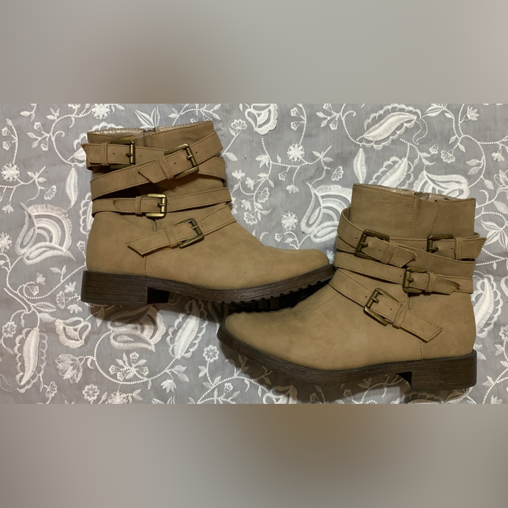 Brown strapped heeled boots